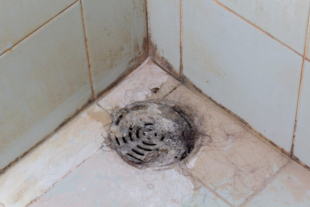 11 Ways To Unclog A Shower Drain, Best Way To Clean A Bathtub Drain Clogged With Hair