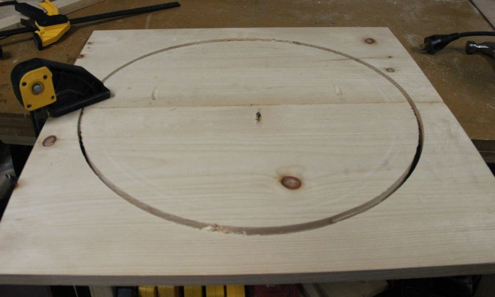 Carve a hole into the plywood