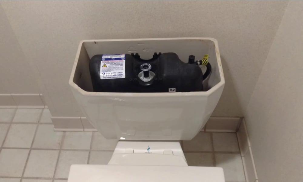 Pressure assisted toilets