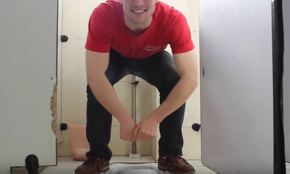 Stand over the squat toilet