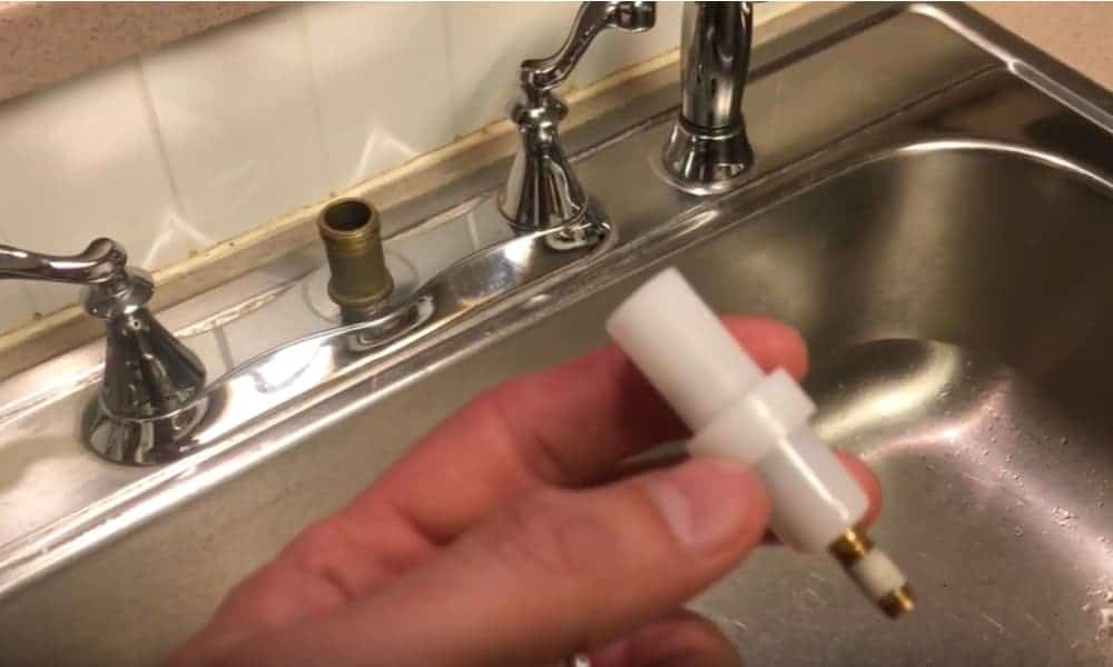 my kitchen sprayer is not on the sink properly