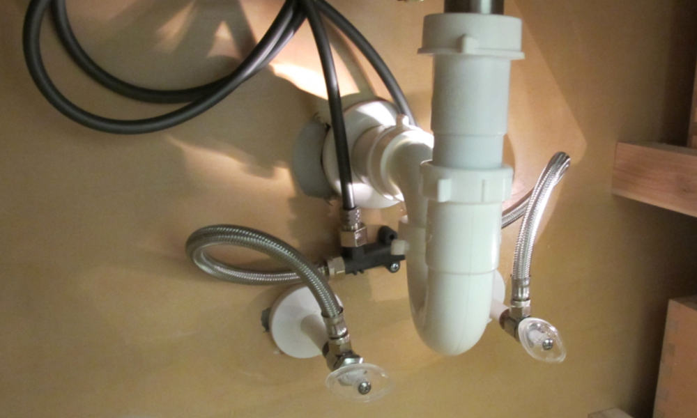 turning water off under bathroom sink