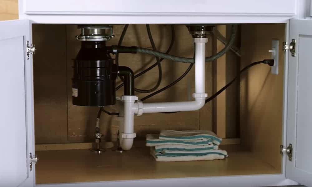 how to remove a garbage disposal from a kitchen sink