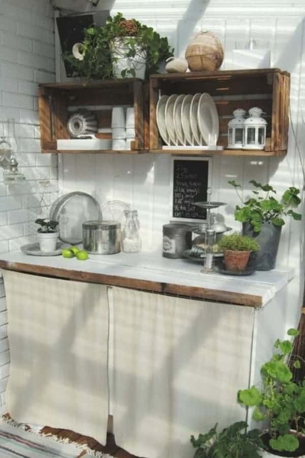 Outdoor kitchen with crate shelving