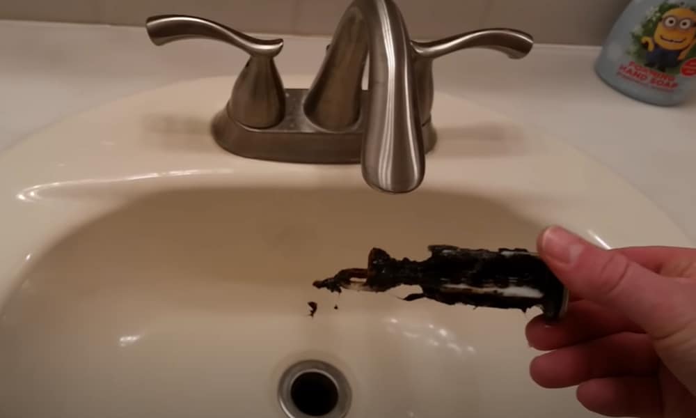 bathroom sink drain stoper stuck shut